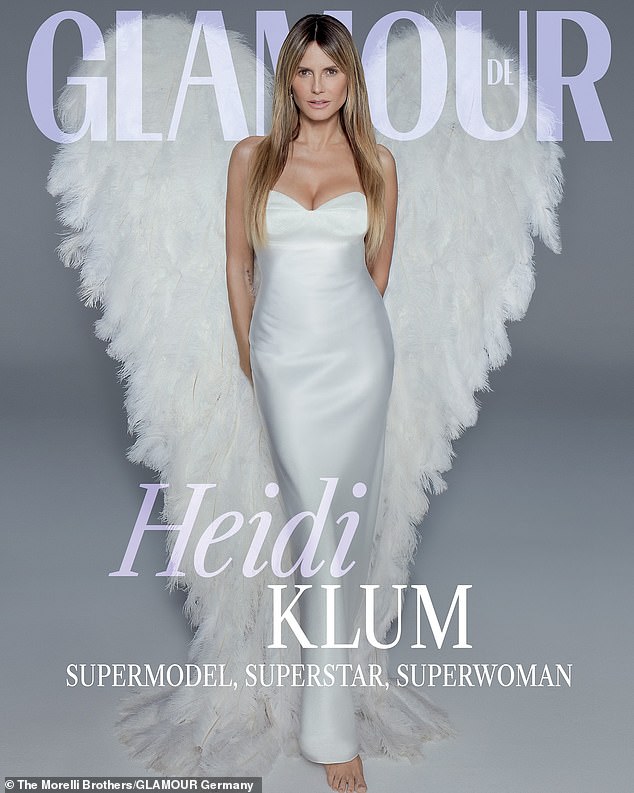 She looked angelic in the glamorous photoshoot as she posed with huge fur wings around her shoulders.