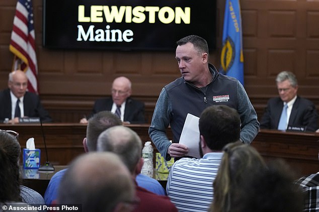 Shooting survivor Mike Roderick returns to his seat after addressing a public meeting with a commission investigating the October 2023 shootings, Monday, March 4, 2024, in Lewiston, Maine.