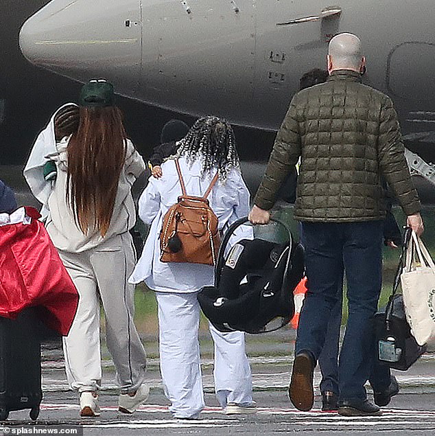 The couple was later seen boarding the plane with Rihanna holding her oldest son, RZA Athelston, who is almost two years old.
