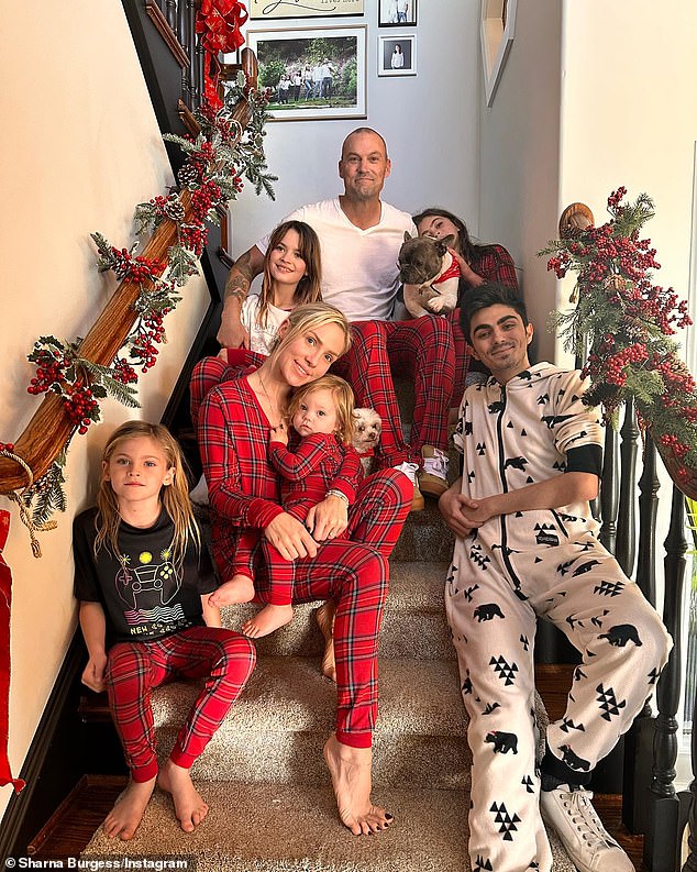 Brian has fathered five children, ages 20 months to 21 years, with his former Beverly Hills, 90210 co-star Vanessa Marcil, his former Hope & Faith co-star Megan Fox, and his fiancée Sharna Burgess (2-L, in the photo from December 25).