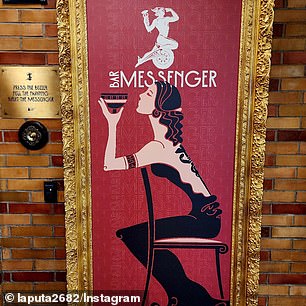 The painting of a flapper-style woman drinking champagne is removed to reveal the quirky Messenger Bar that foodies are raving about.