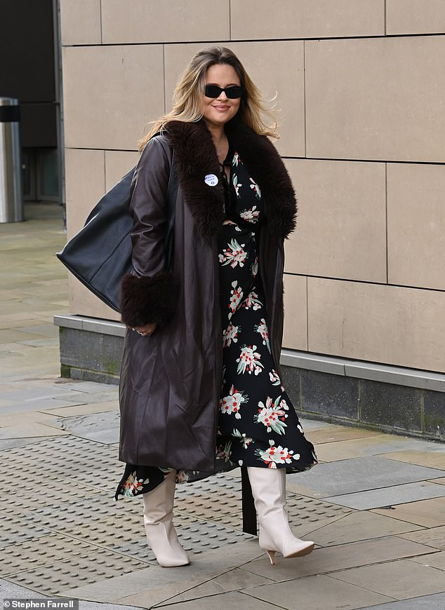 On her way home from the BBC studios at Media City in Manchester, Emily showed off a glimpse of her burgeoning baby bump.