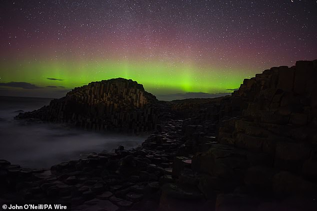 This image of Sunday night's aurora over Giant's Causeway, Northern Ireland, was posted on Twitter by John O'Neill.
