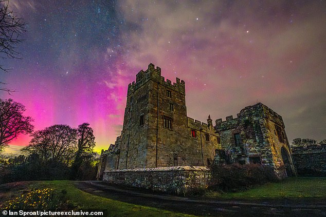 The Northern Lights are most commonly seen in places closer to the Arctic Circle, such as Scandinavia and Alaska, so any sightings in the UK are a treat for sky watchers. Pictured, Naworth Castle in Cumbria, March 3, 2024.