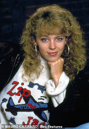A young Kylie Minogue, photographed with voluminous hair during her groundbreaking role in Neighbors