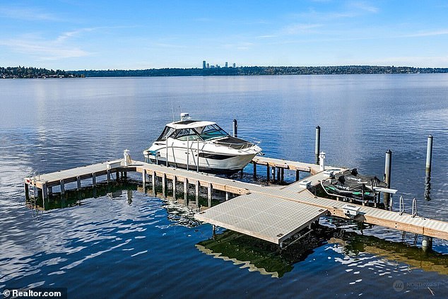 The property is located in Bellevue, a city across Lake Washington with Seattle in the distance.
