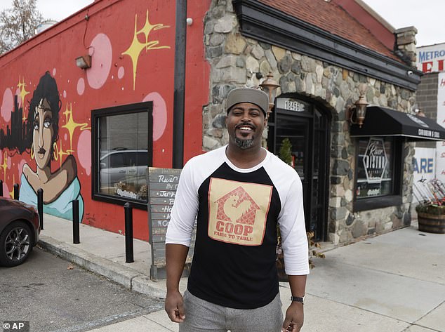 Hardy stands in front of his River Bistro restaurant in Detroit, a Caribbean soul food restaurant that closed during COVID.