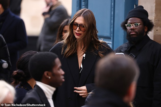 The 36-year-old tennis icon stunned the French capital with her sleek all-black look.