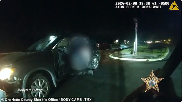 Dashboard and body camera footage shows the hero officer rushing to the scene and rescuing a child from the wrecked car.