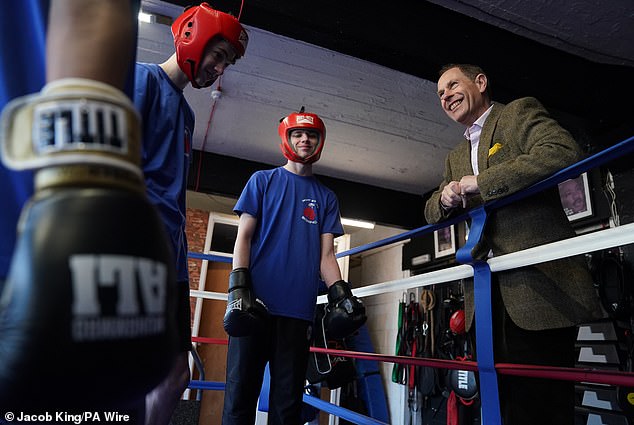 Edward seemed cheerful as he watched the young boxers show off their sporting skills in the ring.
