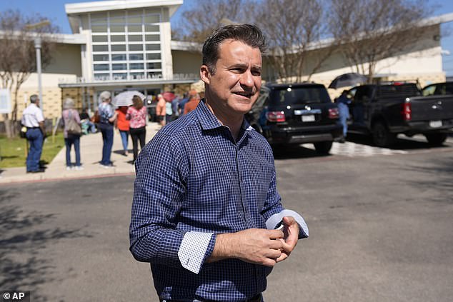 Texas state senator Roland Gutierrez is Allred's only real competitor. Pictured: Gutiérrez campaigns near a voting center in San Antonio, Texas, on Tuesday, March 5.