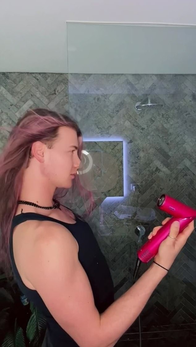 Her new pink locks went from wet to dry while using the hair drying function.