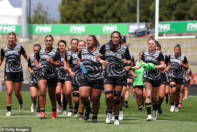 The rugby team's haka leader, Leilani Perese, defends the message of the haka (pictured, Hurricanes players warming up before the game against Chiefs Manawa)