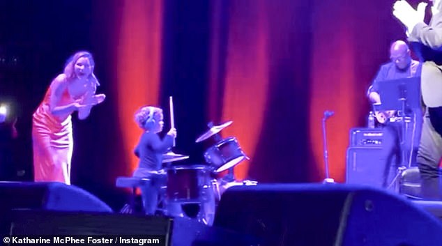 The couple's son also joined his parents on stage to play drums during their performance in Washington, D.C. on Sunday night.