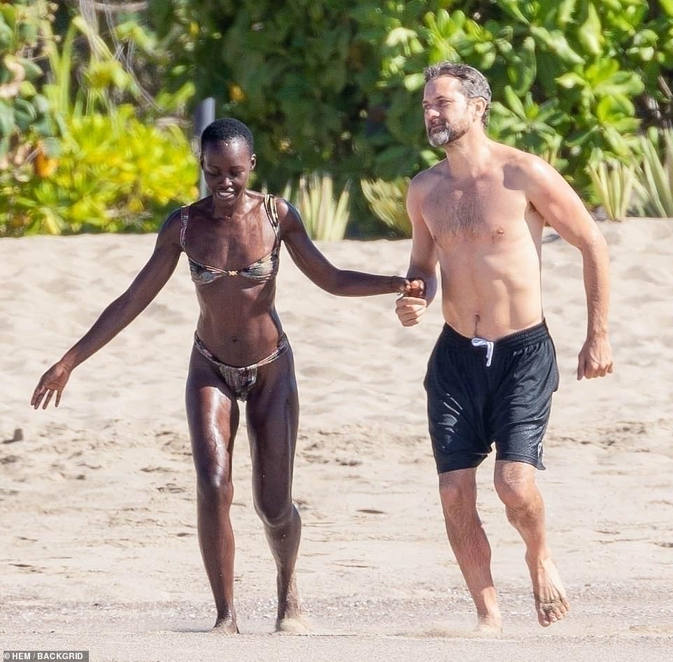 Lupita, who celebrated her birthday on March 1, lovingly embraced Joshua, who split from wife Jodie Turner-Smith last fall.