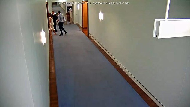 The moment the couple entered Minister Reynold's office (pictured with the security guard)