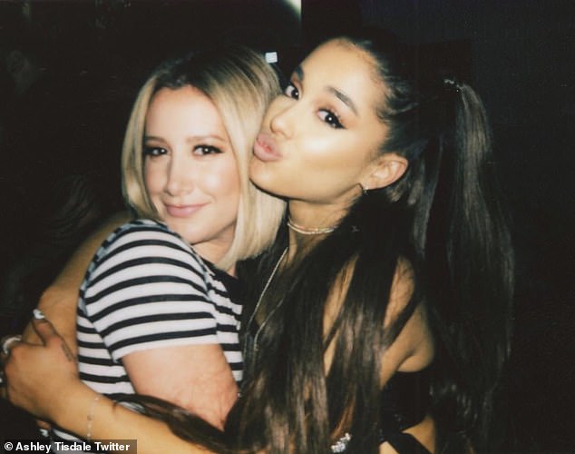 Ashley also revealed that she has known two-time Grammy winner Ariana Grande (right, pictured in 2018) 'since she was 10 years old' because they had the same vocal coach, Eric Vetro.