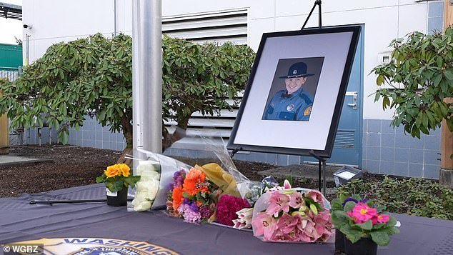 A memorial was set up outside the state patrol headquarters in Marysville in Gadd's honor with pictures of him and flowers as mourners passed by to pay their respects.