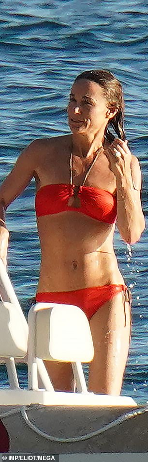 In an orange string bikini from Biondi, worn during a holiday in St Barts