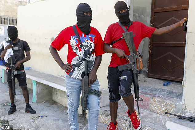masked members of "G9 and family" gang that are part of the recent attacks