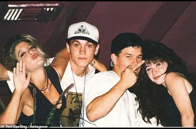 The cast of Beverly Hills, 90210 remained close friends throughout the series and even after its end in 2000; Seen from left, Tori, Brian Austin Green, Mark Wahlberg and Shannen.