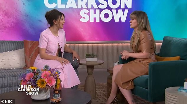 The Stranger Things actress looked hot as she showed off her white bra in a pink outfit as she talked about how she feels at 30, why she loves her donkey and which pop star she's a big fan of.