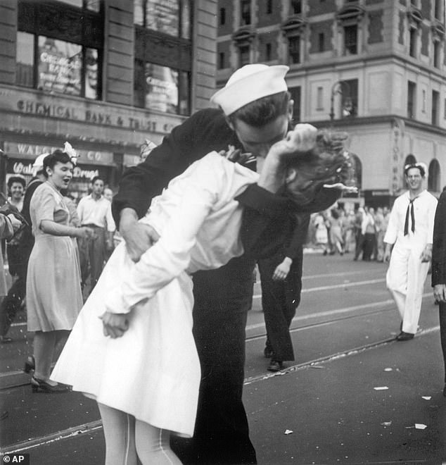 The photograph in question is a black and white photograph of a sailor kissing a woman in Times Square while celebrating the end of World War II in 1945.