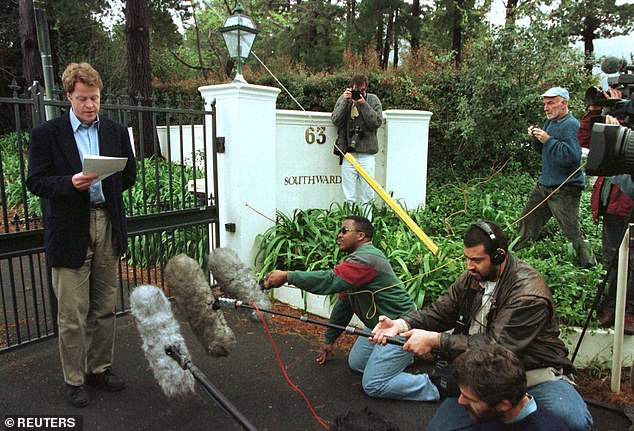 Earl Spencer was photographed addressing journalists outside his home in Cape Town after Diana's death.