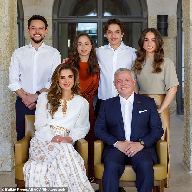 King Abdullah II and Queen Rania of Jordan and their family in a photograph released on New Year's Eve 2022