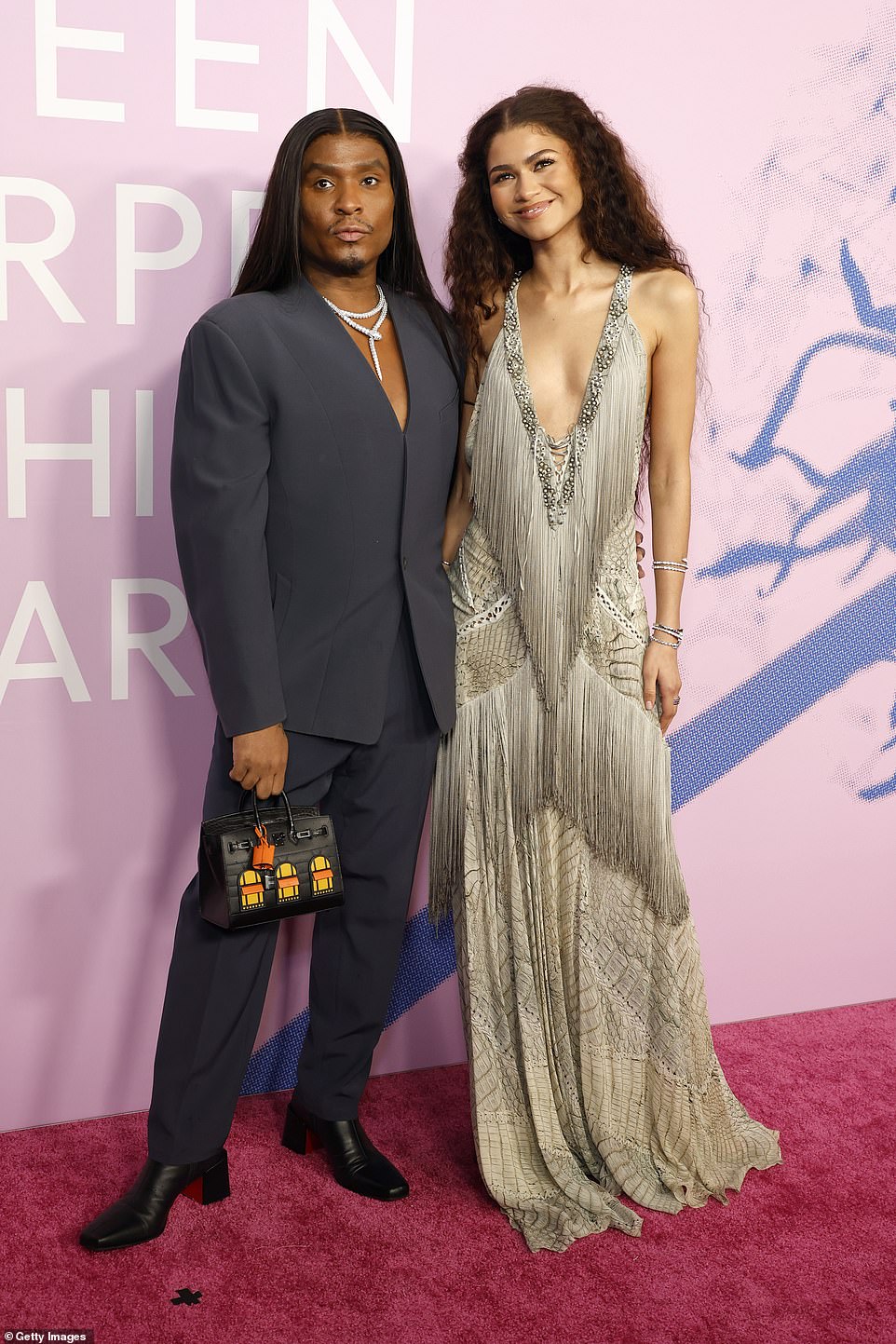 During the event, Zendaya was accompanied by her stylist Law Roach, 45, who looked dapper in a gray suit.