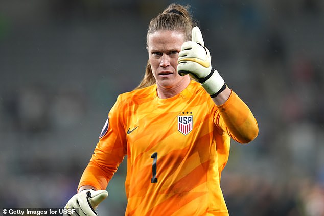 Alyssa Naeher gives a thumbs up during shootout win over Canada