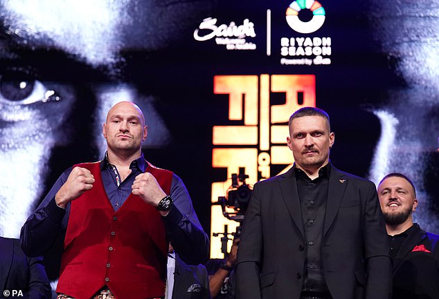 Fury is preparing for a fight against Oleksandr Usyk (right) in May, with the winner facing the victor of Friday's fight.