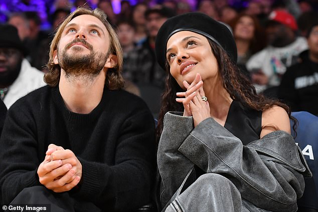 The Dear White People star, 40, looked in high spirits as he joined Brandon, 30, son of controversial tycoon Sir Philip Green, sitting courtside at Crypto.com Arena.