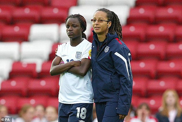 Former Lionesses coach Hope Powell consoles Eni Aluko after defeat to Sweden in 2005