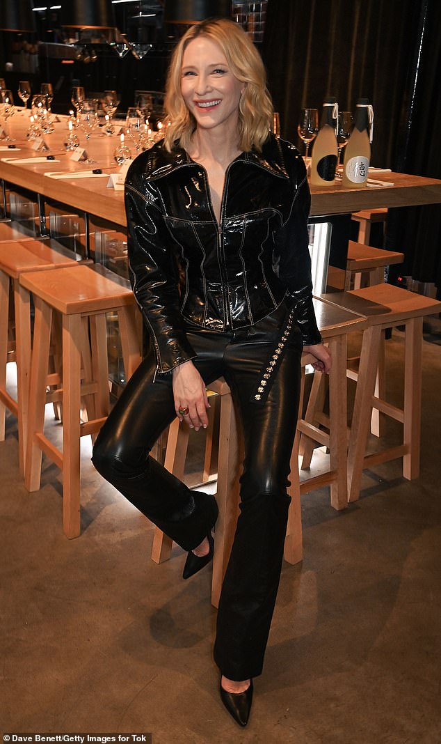 Cate looked sensational in tight black leather pants for the launch event at the capital's Supermarket of Dreams.