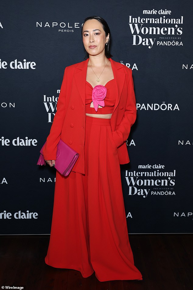 Former MasterChef Australia judge Melissa Leong dressed to impress in a red crop top that featured a pink flower on the front.
