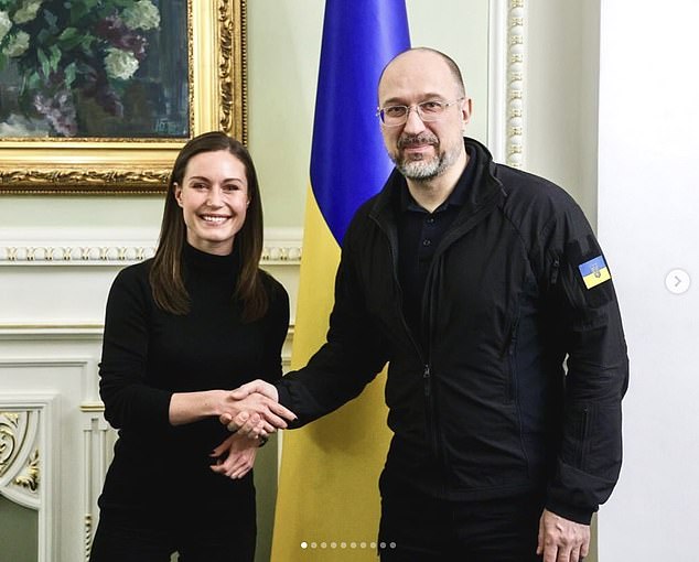 Marin shook off the political dust for a moment, posed for photographs with Mr. Shmyhal and sat down to chat with Finland's ambassador to Ukraine over lunch.