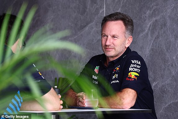 JEDDAH, SAUDI ARABIA - MARCH 8: Oracle Red Bull Racing Team Principal Christian Horner watches in the Paddock before final practice ahead of the Saudi F1 Grand Prix at the Jeddah Corniche Circuit on March 8, 2024 in Jeddah, Saudi Arabia. (Photo by Clive Rose/Getty Images)
