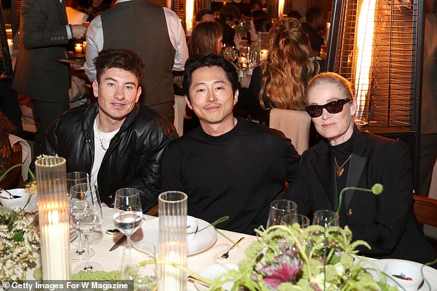 He sat at the table with Steven Yeun and Lisa Love.
