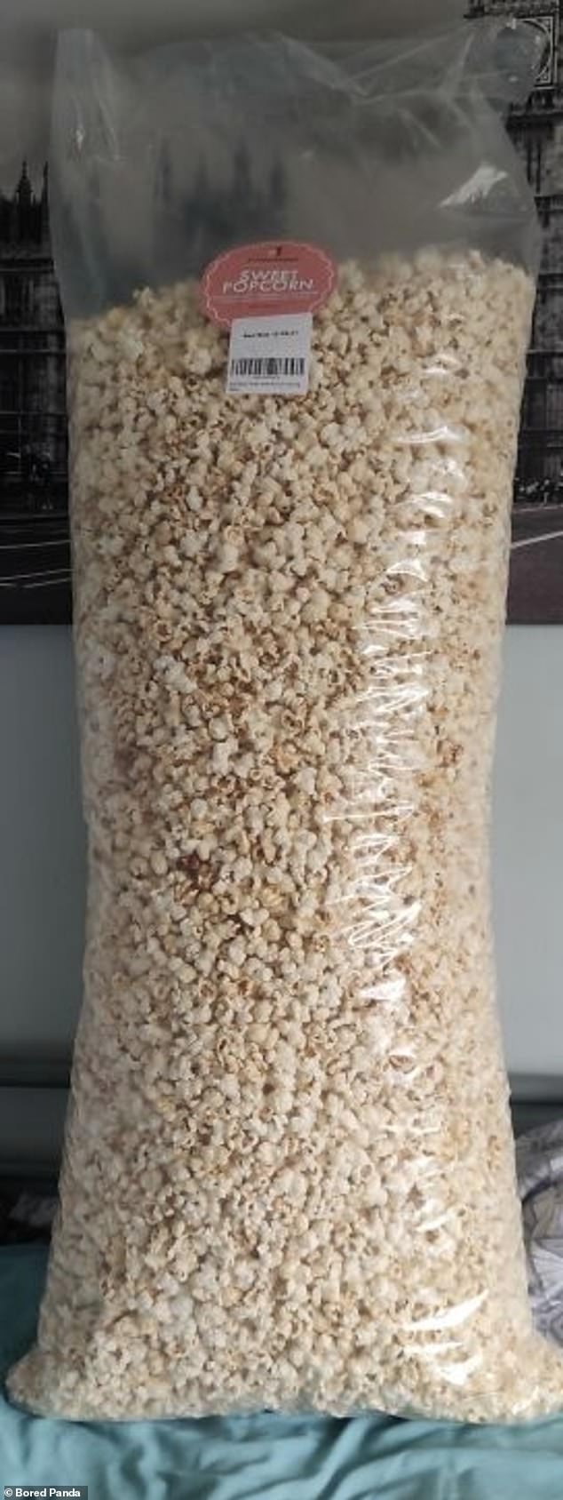 MASSIVE PORTION: Elsewhere, a university student in the UK was delighted when he received the giant portion of popcorn he had ordered on Amazon.