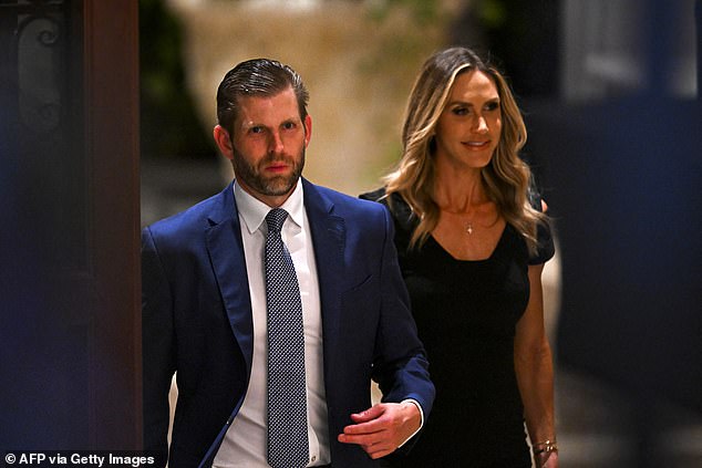 Eric Trump (left), the former president's son, and his wife Lara Trump attend a Super Tuesday election night viewing party at the Mar-a-Lago Club in Palm Beach, Florida.