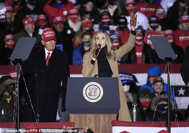 Lara Trump has become a familiar face at Trump campaign events. She is seen here with her father-in-law at the Kenosha Regional Airport, Wisconsin, in November 2020.