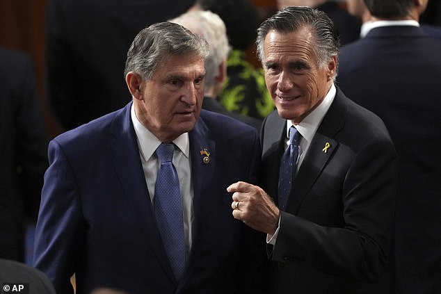 Romney was seen sitting and speaking with fellow retired senator Joe Manchin for the president's State of the Union address.