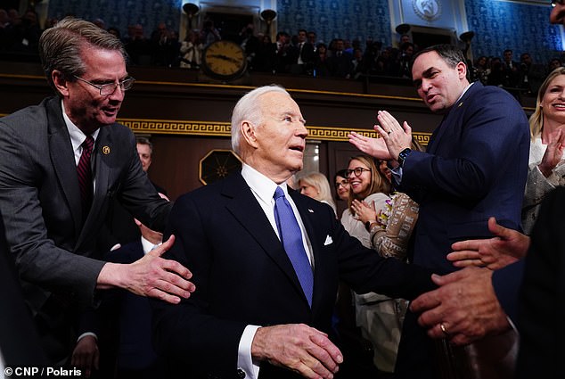 Biden arrives on the House floor of the US Capitol for his third State of the Union address on Thursday, during which he announced initiatives to address the housing affordability crisis.