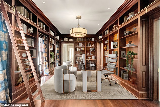 With wall-to-wall shelving including a moving ladder and a workstation overlooking the tranquil garden, the huge library and private office are ideal for home workers.