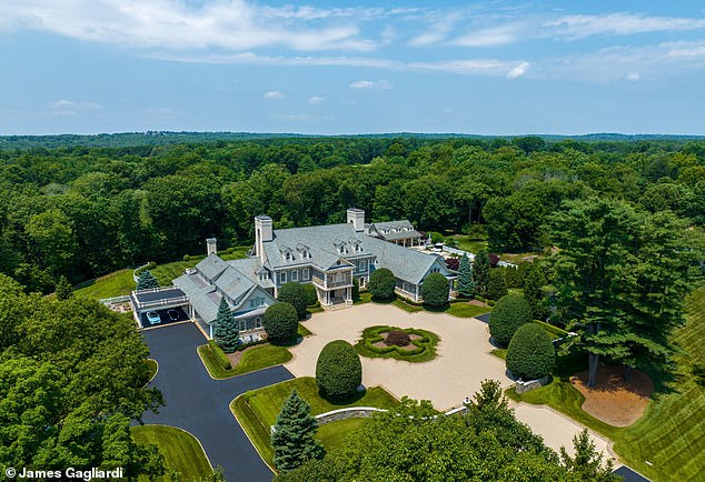 1709937086 226 Gray Goose execs stunning Connecticut mansion with a 35 car garage