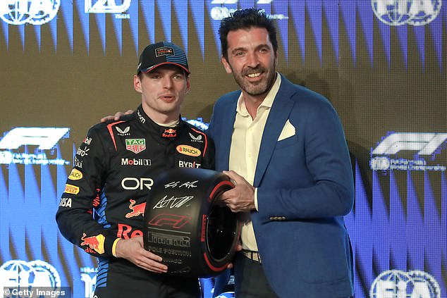 Gianluigi Buffon presented Max Verstappen with his prize for pole position in qualifying