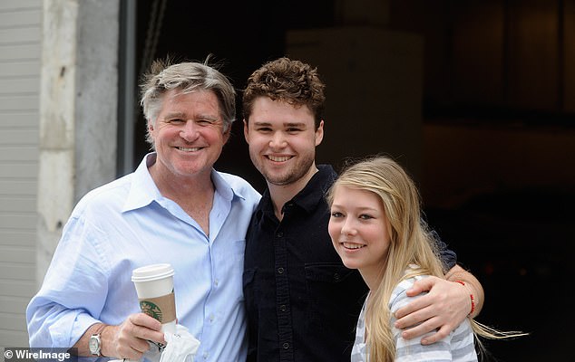 Williams' son, Gill Williams (center), said the family did not want to press charges or see Koss jailed. Pictured: Williams with his son and his daughter Ellie Williams in 2012.
