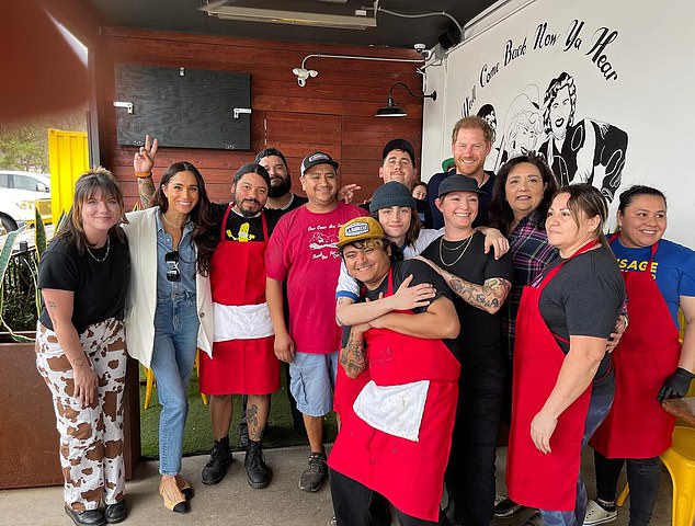 The Duke and Duchess of Sussex were all smiles as they met with restaurant employees on Friday.