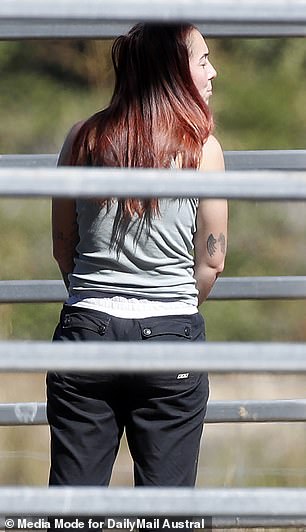 Harbor showed off her tattoos when she was seen tending a horse on Friday.